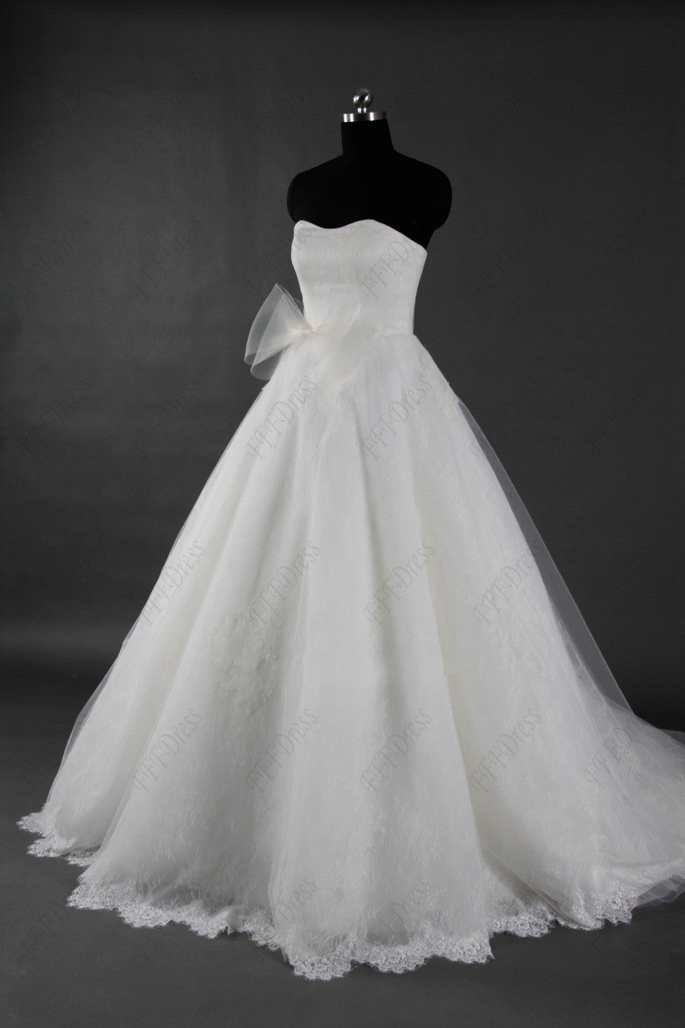 Lace sweetheart ball gown wedding dress with sash