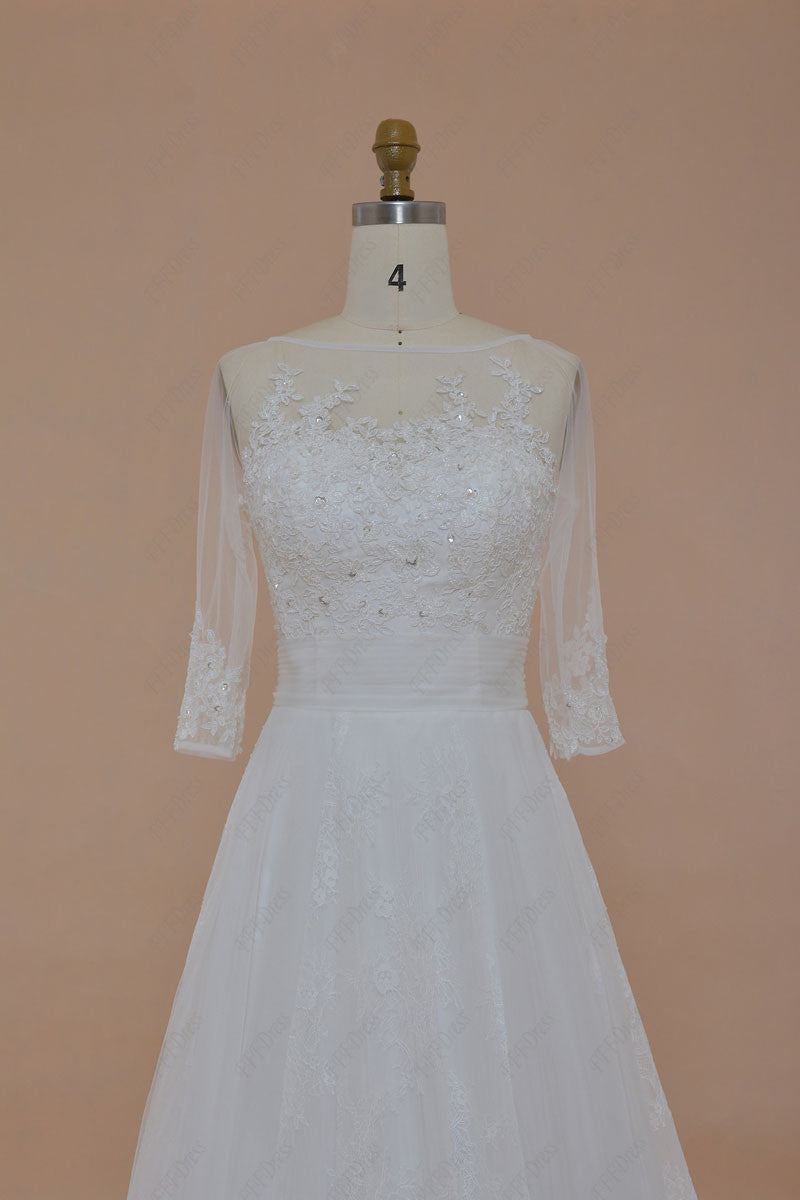 Beaded lace wedding dress with sleeves