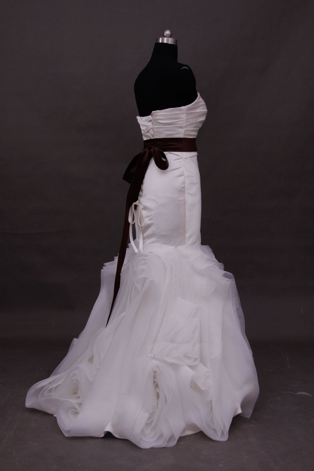 Mermaid swirled wedding dress with brown sash
