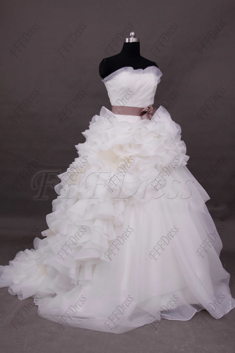 Ball gown wedding dress with dusty rose sash