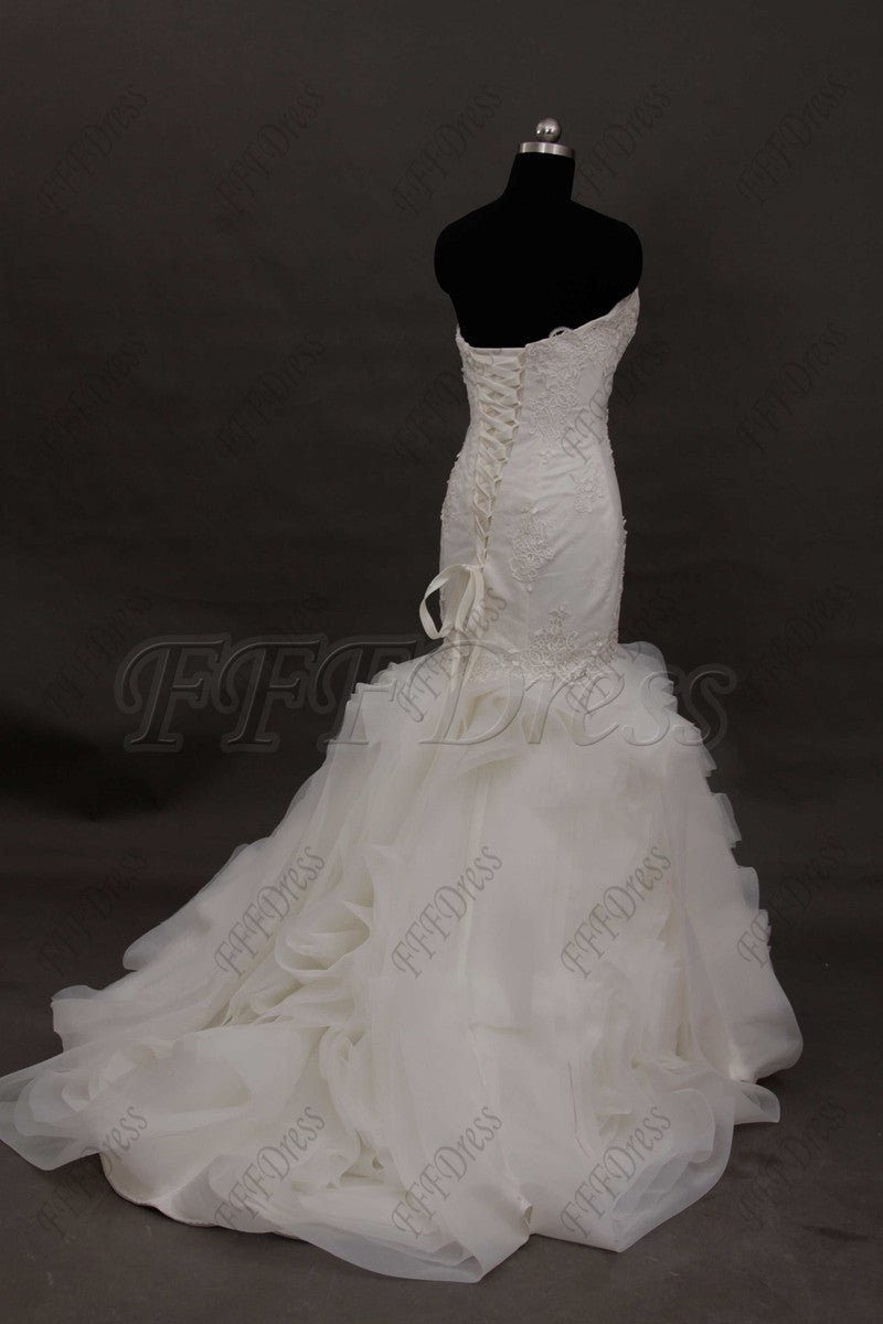 Mermaid swirled wedding dresses with feathers