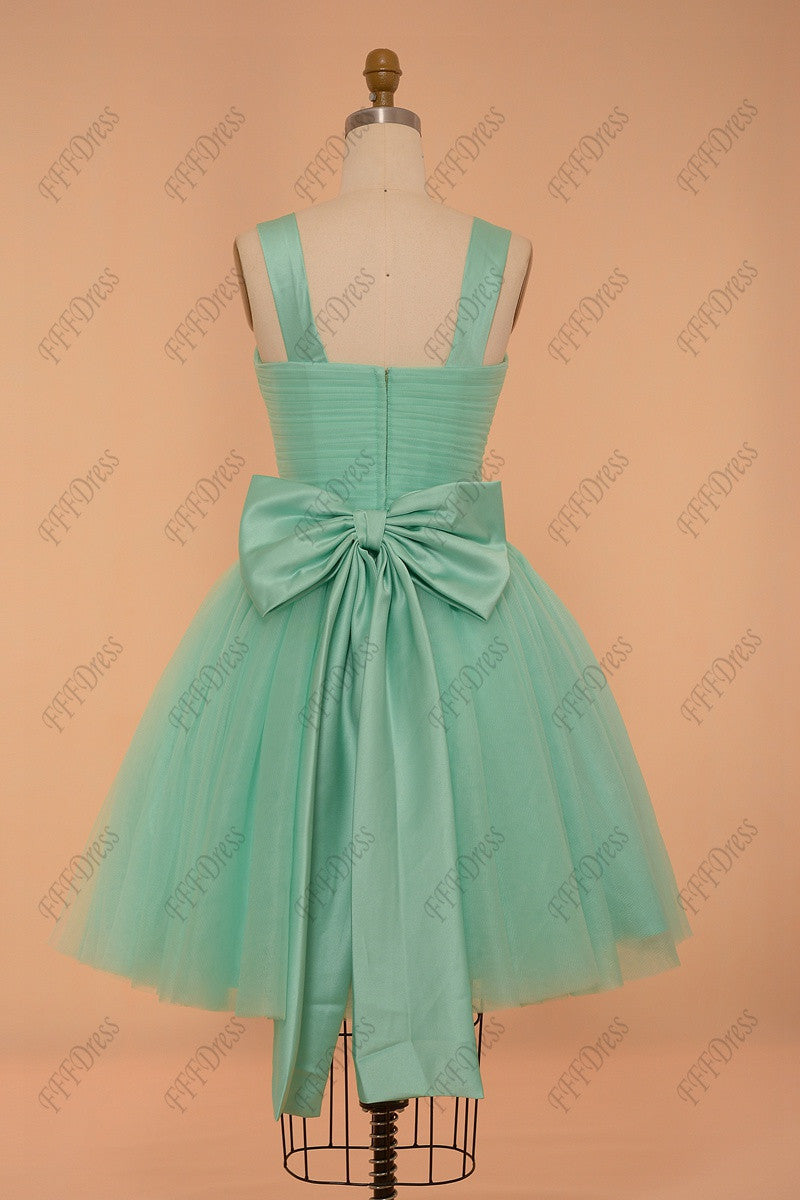 Mint green ball gown bridesmaid dress with bow