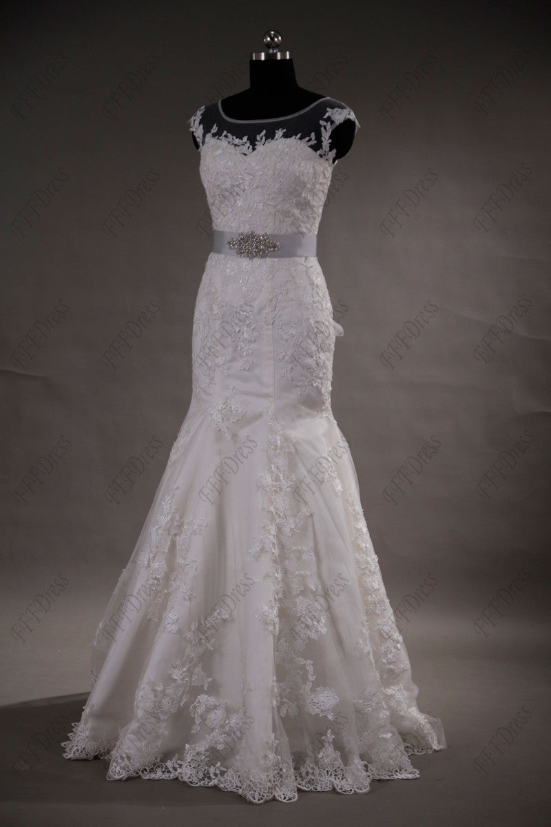 Mermaid lace wedding dress with beaded silver sash
