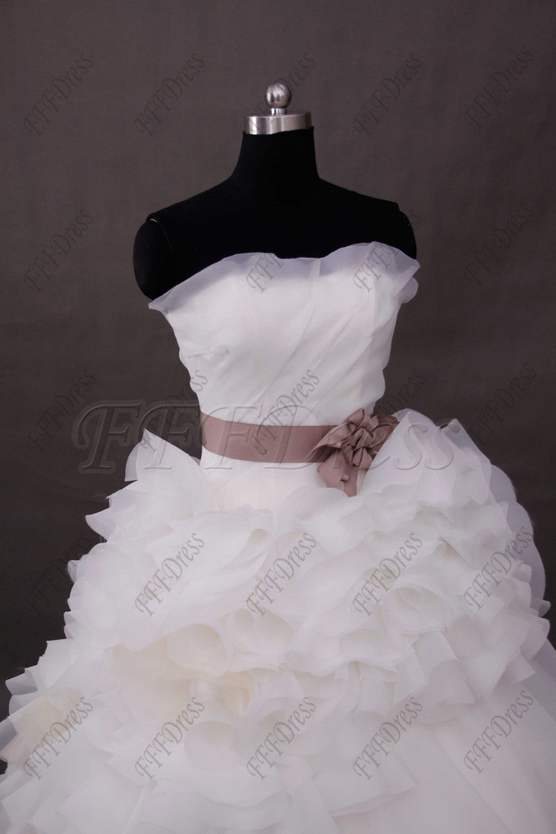 Ball gown wedding dress with dusty rose sash