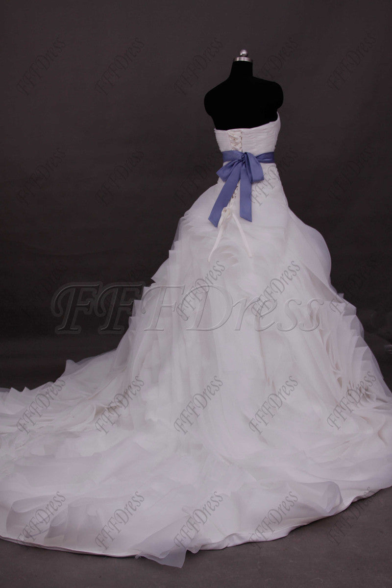 Ball gown swirls wedding dress with blue sash